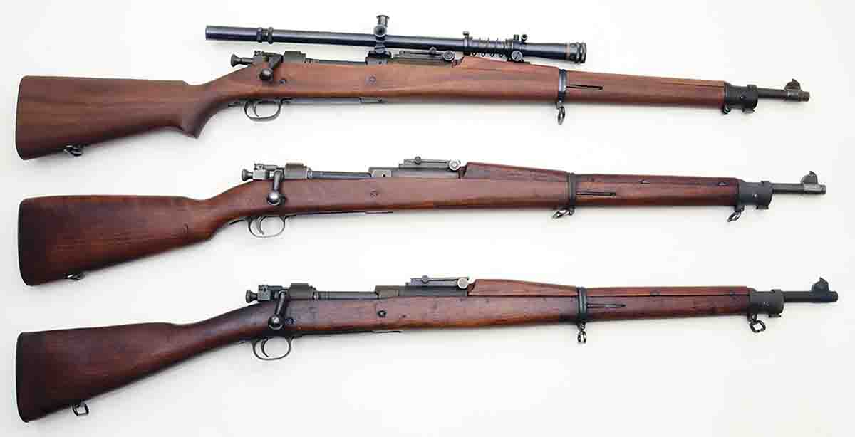 These three Springfield M1903s exhibit the three basic stock styles found on U.S. Models 1903, 1903A3 and 1903A4: a C-stock with pistol grip (top), a Scant C-stock with a mild pistol grip (center) and an S-stock with straight grip (bottom).